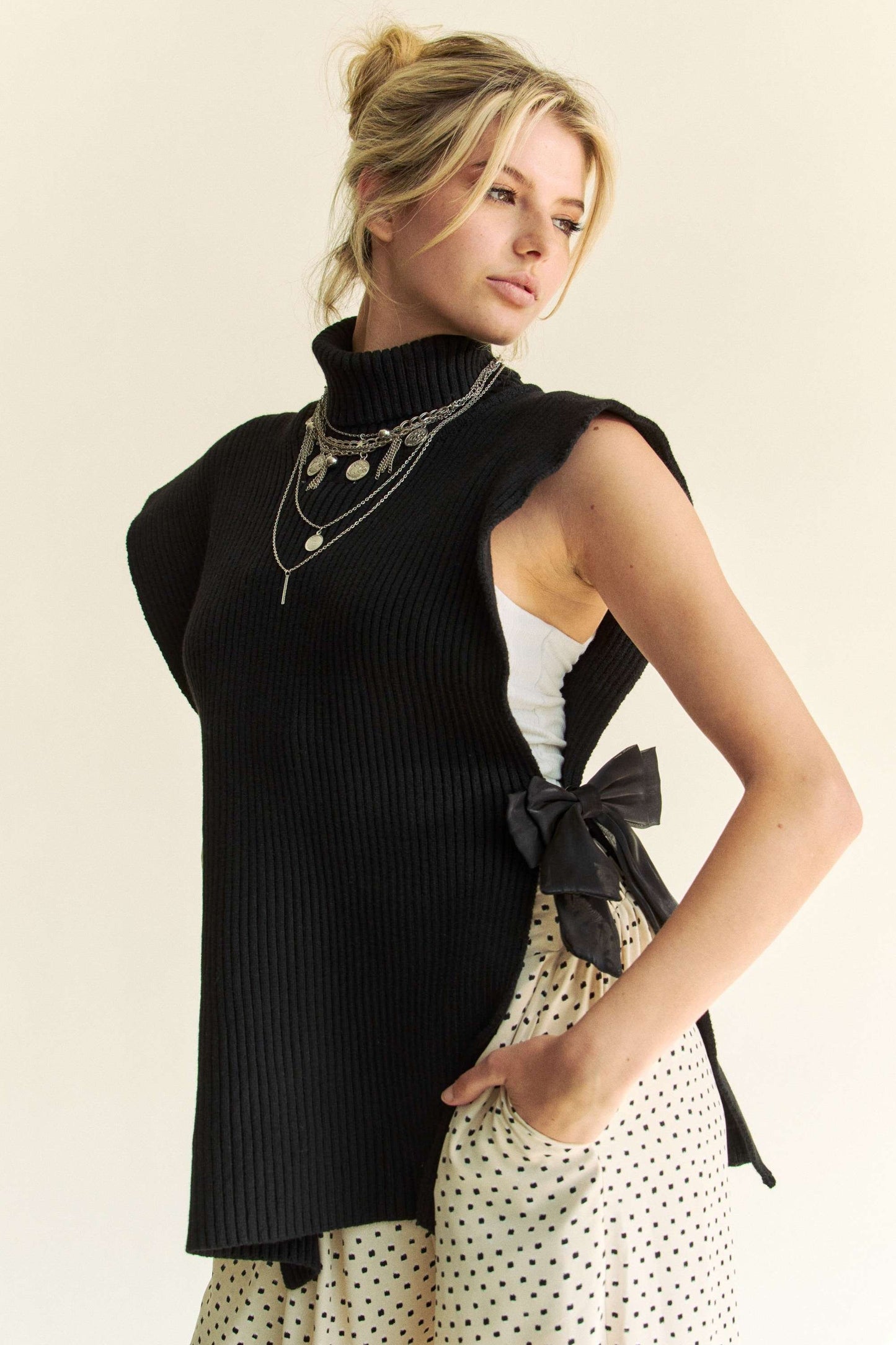 Women's Black Ribbed Sideless Turtleneck Sweater